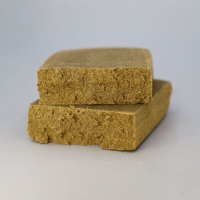 Bild auf grauem Hintergrund von CBD Hash Ketama Sunset von Greenery420